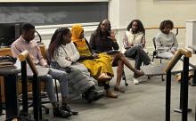Blyden conducting discussion with students